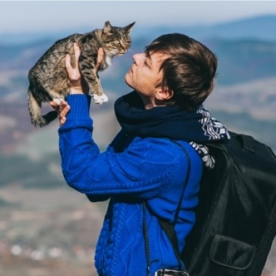 Girl kissing her cat